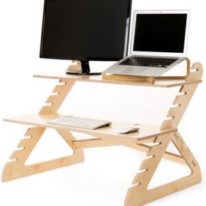 Handmade Plywood Laptop and Desktop Stand Elevate your workspace with this handmade plywood stand, designed to accommodate both laptops and desktops. Its sturdy construction and minimalist design provide a sleek and practical solution for ergonomic computing.